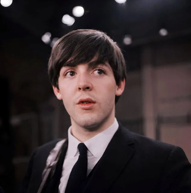 In this February 1964 file photo, the Beatles' Paul McCartney is shown on the set of the Ed Sullivan Show. (Photo by AP Photo)