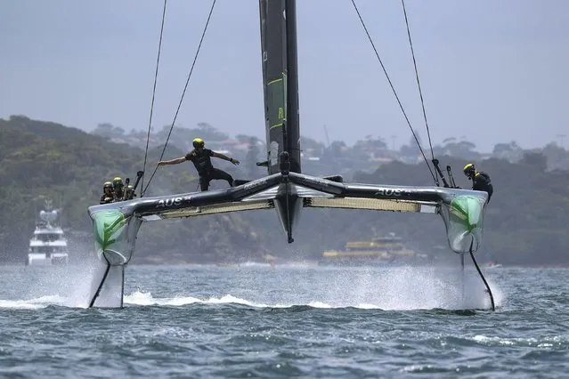 In this image provided by SailGP, Australia SailGP Team helmed by Tom Slingsby compete during a practice race for the Australia Sail Grand Prix, Thursday, December 16, 2021. (Photo by Bob Martin/SailGP via AP Photo)