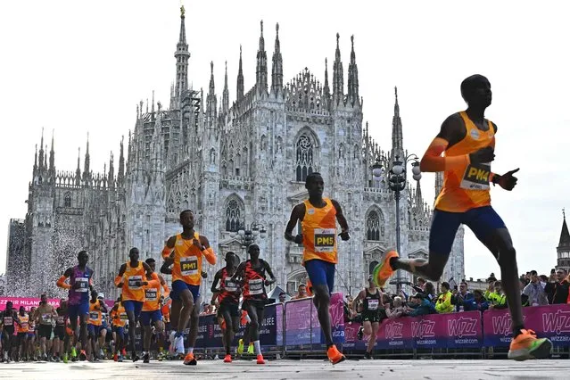 Athletes take the start of Milan's marathon at Piazza Duomo on April 7, 2024. (Photo by Gabriel Bouys/AFP Photo)