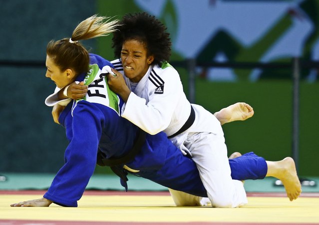 Miryam Poper (R) of Germany and Automne Pavia of France fight during their women's 57kg judo bronze medal fight of Portugal at the 1st European Games in Baku, Azerbaijan, June 25 , 2015. (Photo by Kai Pfaffenbach/Reuters)