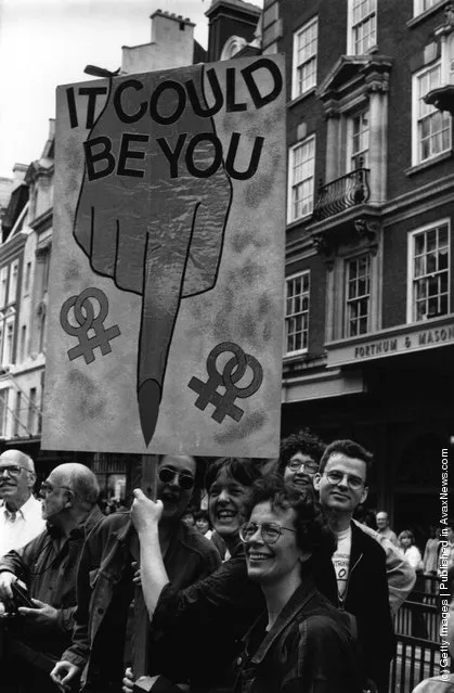 Demonstrators on the annual Gay Pride march, promoting gay and lesbian rights, London, 26th June 1995