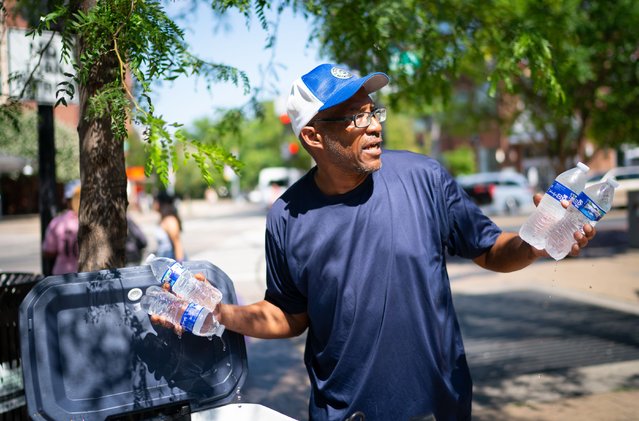 Terrell Munson, 60, of DC is working his summer job selling water in the Columbia Heights neighborhood, of Washington, DC on Friday, June 21, 2024. He is a high school chemistry, physics and math teacher during the school year. (Photo by Sarah L. Voisin/The Washington Post)