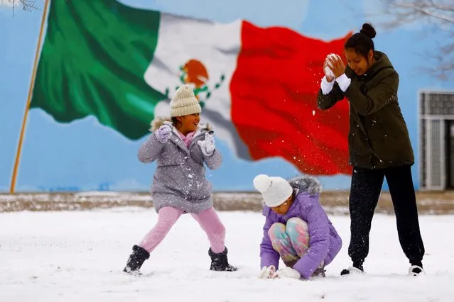 Children play in the snow after a winter storm in Ciudad Juarez, Mexico on February 3, 2022. (Photo by Jose Luis Gonzalez/Reuters)