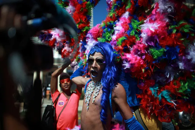 A participant reacts during the Annual March against Homophobia and Transphobia in Havana, May 14, 2016. (Photo by Alexandre Meneghini/Reuters)