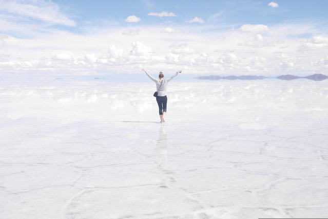 “Feeling free at the world’s largest salt flat. After a 48-hour journey I would rather forget (including hugging Bolivian mountains on a treacherous coach journey) it was a relief to reach Salar de Uyuni. I remember sharp, glistening salt in between my toes and a warm sun that left my cheeks rosy for days”. (Photo by Holly Snelling/GuardianWitness)
