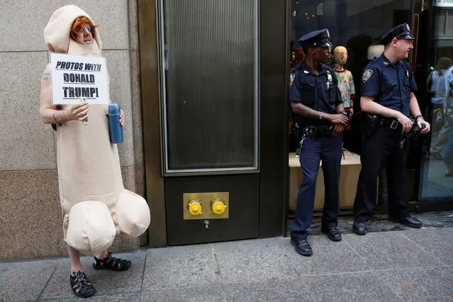 A man demonstrates outside Republican presidential candidate Donald Trump's news conference at Trump Tower in New York, U.S., May 31, 2016. (Photo by Shannon Stapleton/Reuters)