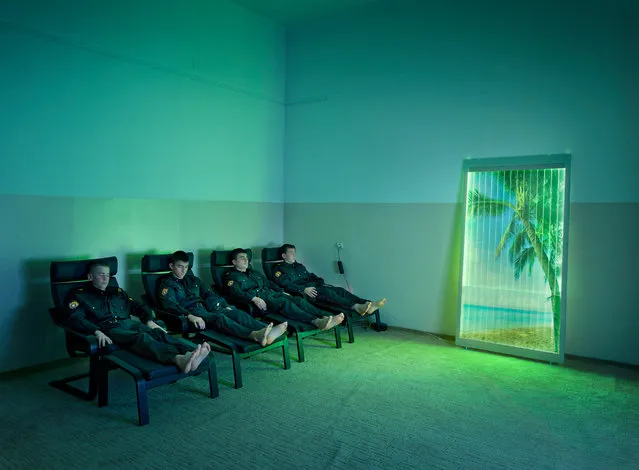Young police officers taking part in an audiovisual psychotherapeutic treatment at MVD police school in Grozny, Chechen Republic. (Photo by by Frank Herfort/The Guardian)
