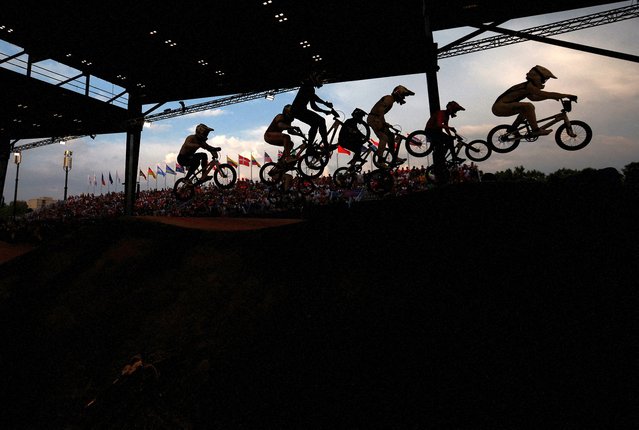 Athletes in action during heat two of the men's BMX quarterfinals on August 1, 2024. (Photo by Agustin Marcarian/Reuters)