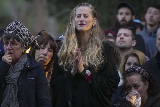 Relatives and friends of 1st Sgt. Hillel Diener, who was killed in combat in the Gaza Strip, mourn during his funeral at the Mount Herzl military cemetery in Jerusalem, Israel, Tuesday, December 24, 2024. (Photo by Ohad Zwigenberg/AP Photo)