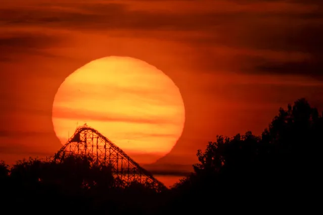 Picture dated August 9th, 2022 shows the sun setting in Blackpool after another hot day with temperatures to rise even higher over the next few days. (Photo by Mark McNeill/Bav Media)