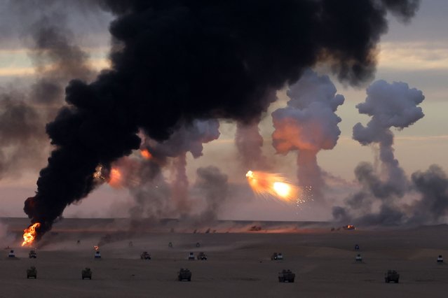 Troops from the Gulf Cooperation Council (GCC) countries participate in a joint military exercise titled “Integration 1” at the Udari range northwest of Kuwait City on December 6, 2023. (Photo by Yasser Al-Zayyat/AFP Photo)