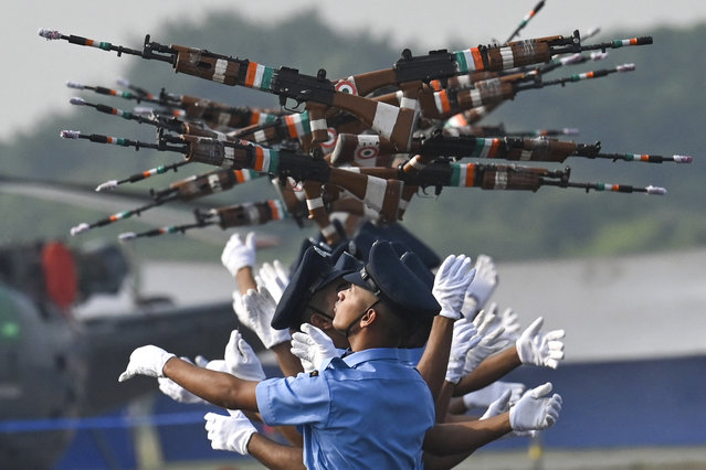 Indian Airforce cadets perform a drill during a graduation ceremony at Tambaram Air Force station in Chennai on November 18, 2022. (Photo by Arun Sankar/AFP Photo)