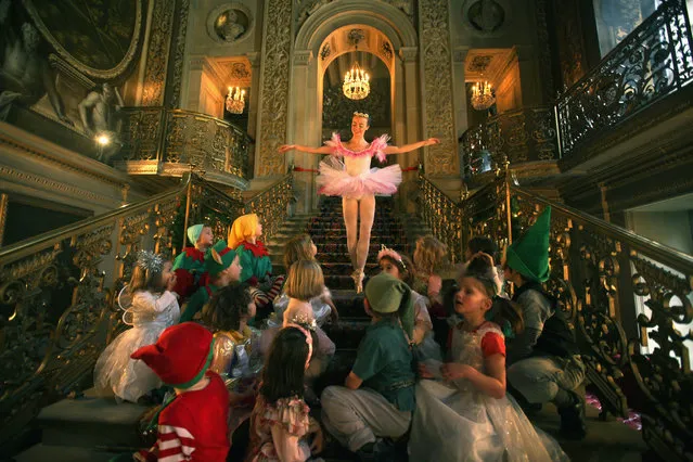CHATSWORTH, ENGLAND - NOVEMBER 09:  The Sugar Plum Fairy, alias Chatsworth guide Claire Fowler, entertains local school children in the painted hall of Chatsworth as the stately home's Russian themed Christmas events get underway on November 9, 2010 in Chatsworth, England. The Derbyshire stately home of the Duke and Duchess of Devonshire has been transformed for the festive season into a scene  reminiscent of The Nutcracker.   (Photo by Christopher Furlong/Getty Images)