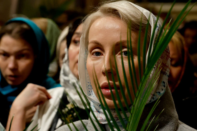Russian Orthodox believers attend a Palm Sunday service at St. Isaac's Cathedral in St. Petersburg, Russia, 13 April 2025. Palm Sunday in many Christian churches symbolically marks the entry of Jesus Christ into Jerusalem, signaling the start of Holy Week before Easter. (Photo by Anatoly Maltsev/EPA/EFE)