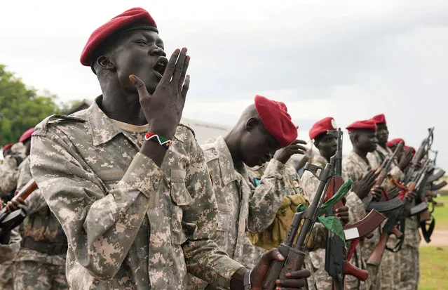 Presidential protection guards from South Sudan's People Defence Force (SSPDF) cheer as they stand in a formation at their training site in Rejaf West, outside Juba, South Sudan, April 26, 2019. (Photo by Andreea Campeanu/Reuters)
