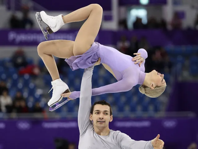 USA' s Alexa Scimeca Knierim and USA' s Chris Knierim compete in the pair skating free skating of the figure skating event during the Pyeongchang 2018 Winter Olympic Games at the Gangneung Ice Arena in Gangneung on February 15, 2018. (Photo by Lucy Nicholson/Reuters)