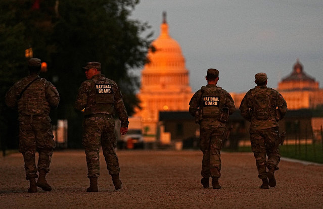 Members of the National Guard walk down the National Mall weeks after U.S. President Donald Trump deployed the National Guard and ordered an increased presence of federal law enforcement in Washington, D.C., U.S., September 4, 2025. (Photo by Leah Millis/Reuters)