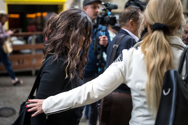 The plaintiff who goes under the name of 'Brigitte' for safety reason arrives for the appeal trial of Swiss leading Islamic scholar Tariq Ramadan over charges of rape and sexual coercion at Geneva's courthouse on May 27, 2024. Tariq Ramadan was acquitted in first instance. (Photo by Fabrice Coffrini/AFP Photo)