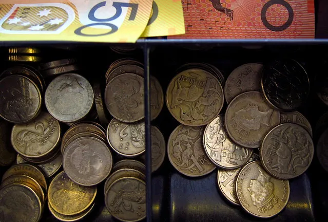 Australian coins and notes can be seen in a cash register at a shop in central Sydney, Australia, February 11, 2016. (Photo by David Gray/Reuters)