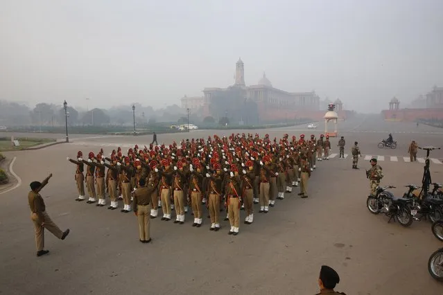 Indian Border Security Force soldiers march during rehearsals for the upcoming Republic Day parade in New Delhi, India, Thursday, January 14, 2015. (Photo by Manish Swarup/AP Photo)