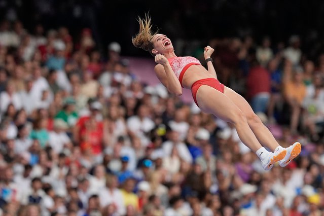 Alysha Newman, of Canada, celebrates a successful vault as she competes in the women's pole vault final at the 2024 Summer Olympics, Wednesday, August 7, 2024, in Saint-Denis, France. (Photo by Rebecca Blackwell/AP Photo)