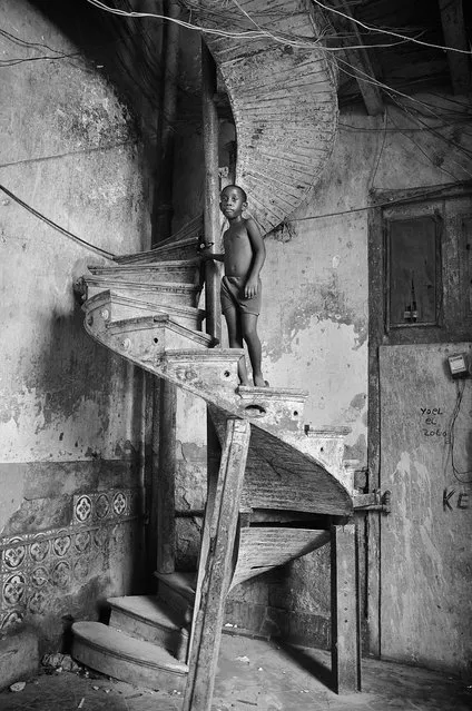 “Splendid Spiral”. This boy's mom invited me to visit their home when I was wondering around the old town in Havana. Sensing that there was a visitor, he ran down and stared at me with his curious eyes. I couldn't take my eyes off the staircase. It is so dilapidated yet somehow I see a splendid spiral, in its old, old glamorous time. (Photo and caption by Elisa Chiu/National Geographic Traveler Photo Contest)