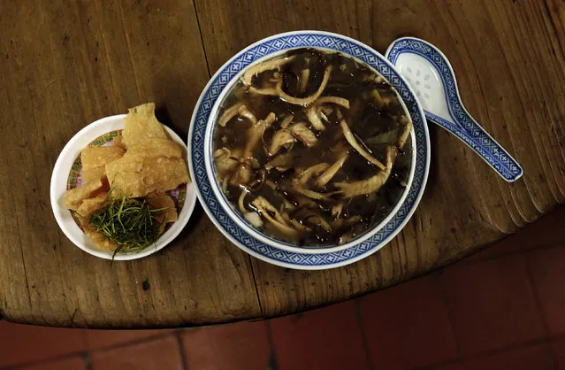 Snake meat is seen in a bowl of snake soup served at a snake soup shop in Hong Kong  January 30, 2013. (Photo by Bobby Yip/Reuters)