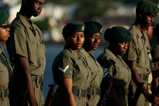 Military members wait for Britain's Prince Harry official welcome ceremony at the port in Pointe Seraphine, St. Lucia, November 24, 2016. (Photo by Carlo Allegri/Reuters)