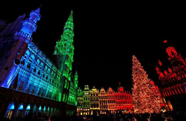Brussels' Grand Place is illuminated during a light show as part as the Christmas “Winter Wonders” (Plaisirs d'Hiver, Winter Pret) festivities, including a Christmas market and other events in central Brussels, Belgium, November 25, 2016. (Photo by Yves Herman/Reuters)