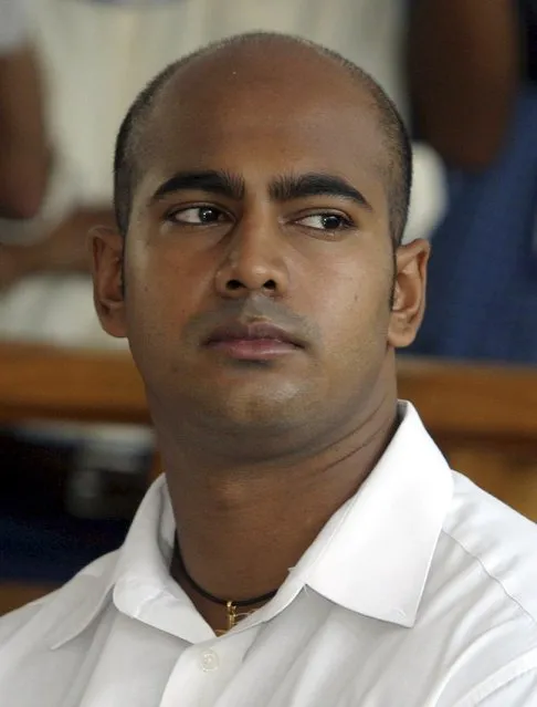 Australian Myuran Sukumaran listens to the prosecutors during his trial at the Denpasar district court in the Indonesian resort island of Bali in this January 24, 2006 file photo. Two convicted Australian drug smugglers, Myuran Sukumaran, 33, and Andrew Chan, 31, were transferred on March 4, 2015, from a Bali prison to an island for execution along with other foreigners, underlining Indonesia's determination to use the death penalty despite international criticism.  REUTERS/Bagus Othman/Files