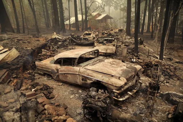 Vehicles destroyed by Dixie Fire are seen in Indian Falls, California, U.S., July 26, 2021. (Photo by David Swanson/Reuters)