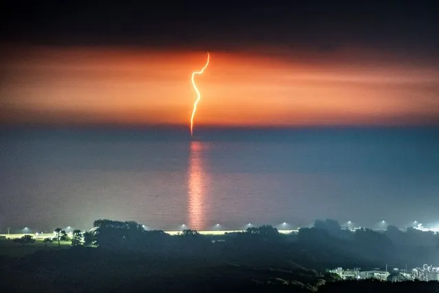 Lightning strikes early of hours of Sunday morning on the Isle of Wight over English Channel on June 18, 2023. (Photo by Jamie Russell/IslandVisions/Bournemouth News)