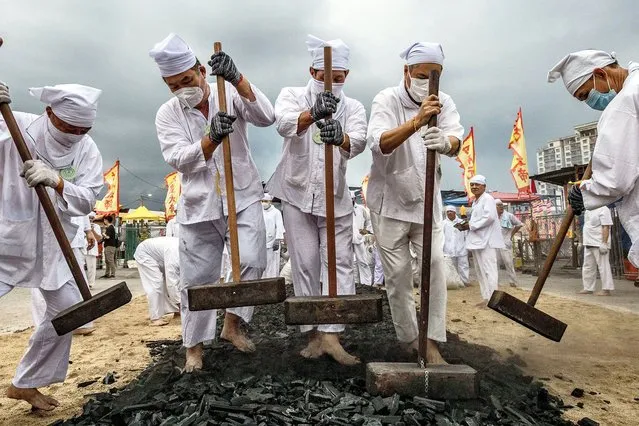 Malaysian Chinese devotees prepare charcoal during The Nine Emperor Gods Festival inside the Kau Ong Ya Temple in Ampang, Selangor on October 23, 2023. Taoists of Malaysia celebrate the beginning of the festival on the eve of the ninth lunar month of the Chinese calendar. The festival, which is held to invoke and welcome The Nine Emperor Gods, is primarily observed in Southeast Asian countries. (Photo by Mohd Daud/ZUMA Press Wire/Alamy Live News)