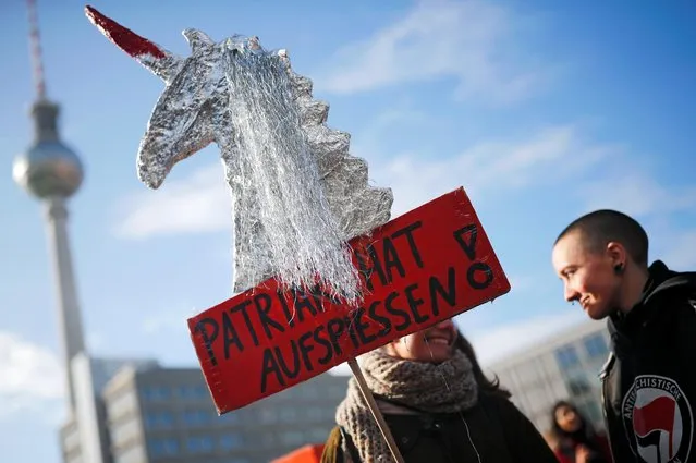 People take part in a march marking International Women's Day in Berlin, Germany on March 8, 2019. The sign reads: “Spike patriarchy!”. (Photo by Hannibal Hanschke/Reuters)