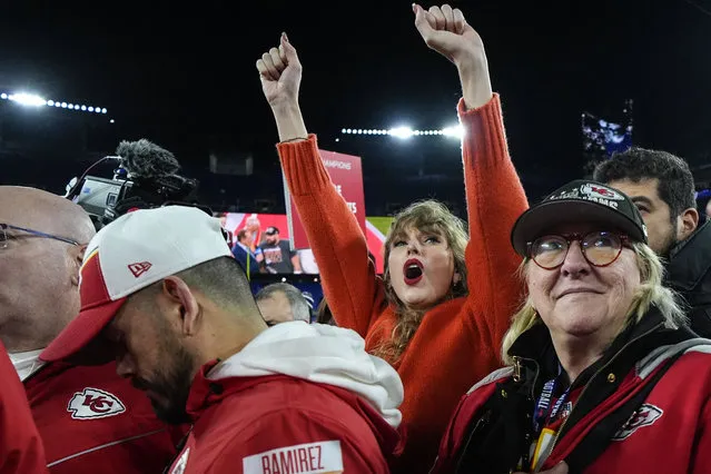 American singer-songwriter Taylor Swift, left, and Donna Kelce watch the Kansas City Chiefs receive the Lamar Hunt trophey after an AFC Championship NFL football game between the Baltimore Ravens and the Kansas City Chiefs, Sunday, January 28, 2024, in Baltimore. The Kansas City Chiefs won 17-10. (Photo by Julio Cortez/AP Photo)