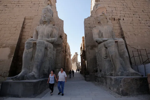 Tourists walk through Luxor temple in the port city of Luxor, south of Cairo Egypt December 14, 2016. (Photo by Amr Abdallah Dalsh/Reuters)