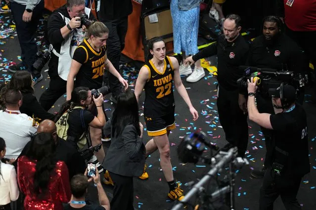 Iowa Hawkeyes guard Caitlin Clark (22) walks off the court after their game against the South Carolina Gamecocks in the finals of the Final Four of the women's 2024 NCAA Tournament on April 7, 2024. (Photo by Aaron Doster/USA TODAY Sports)