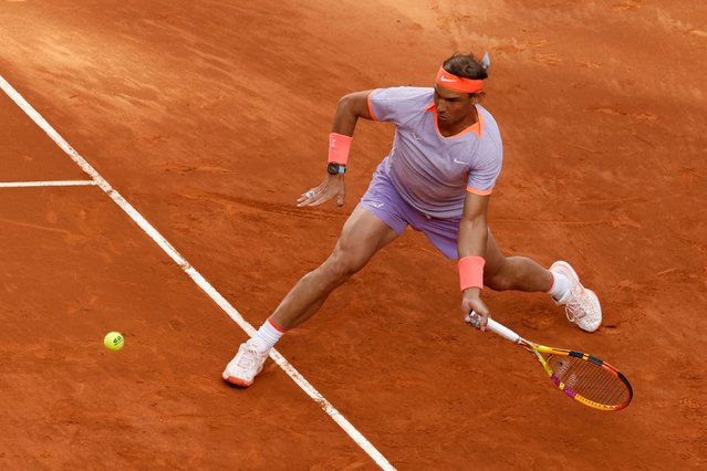 Spain's Rafael Nadal returns the ball to US' Darwin Blanch during the 2024 ATP Tour Madrid Open tennis tournament singles match at Caja Magica in Madrid on April 25, 2024. (Photo by Oscar Del Pozo/AFP Photo)