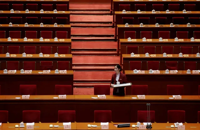 An attendant prepares ahead of the opening session of the Chinese People's Political Consultative Conference (CPPCC) at the Great Hall of the People in Beijing, China, March 3, 2017. (Photo by Jason Lee/Reuters)