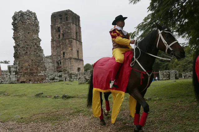 A man dressed as old colonial Spaniard rides a horse during the activities celebrating the 500 anniversary of the founding of Panama City, at the site of the ruins of Old Panama, Thursday, August 15, 2019. The city was founded on August 15, 1519, by Spanish conquistador Pedro Arias Davila. On Jan. 28 1671, the Welsh pirate Henry Morgan attacked the city and destroyed it. The attack caused the city to be rebuilt a few kilometers to the west on a new site. (Photo by Eric Batista/AP Photo)