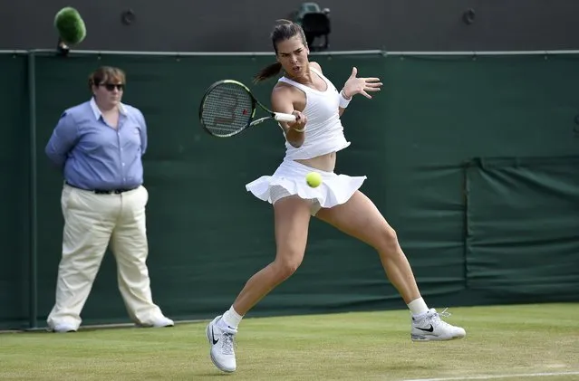 Ajla Tomljanovic of Australia hits a shot during her match against Agnieszka Radwanska of Poland at the Wimbledon Tennis Championships in London, July 2, 2015. (Photo by Toby Melville/Reuters)