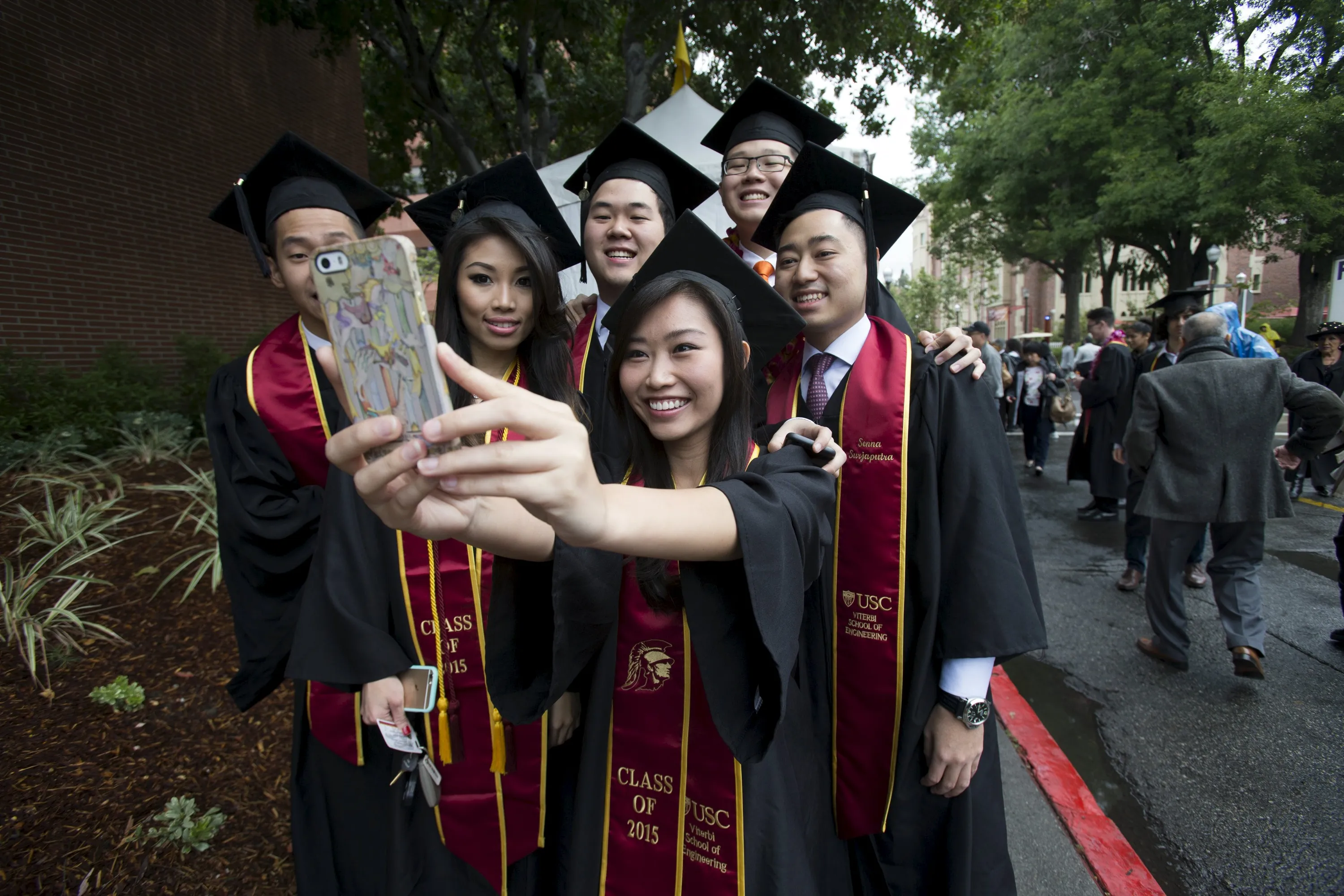 Graduating students take a selfie following USC's Commencement Ceremon...