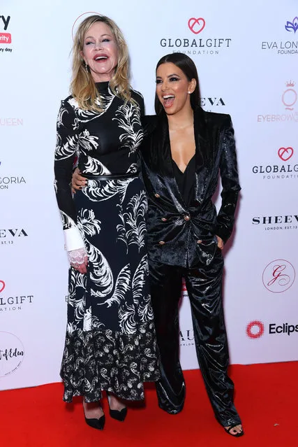 Melanie Griffiths and Eva Longoria Baston attend the annual Global Gift Gala London at Kimpton Fitzroy Hotel on October 17, 2019 in London, England. (Photo by David Fisher/Shutterstock)