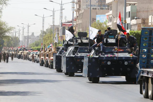 Iraqi security forces vehicles take part in a military parade in the streets of Baghdad, Iraq July 12, 2016. (Photo by Khalid al Mousily/Reuters)