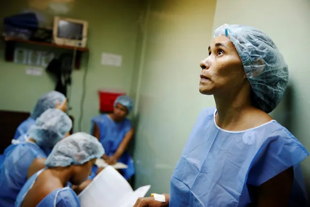 Women wait for sterilization surgery a hospital in Caracas, Venezuela July 27, 2016. (Photo by Carlos Garcia Rawlins/Reuters)