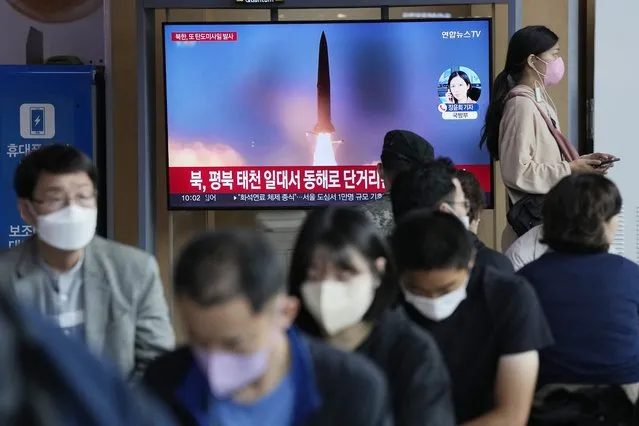 A file image of a missile launch by North Korea is shown on a news program at the Seoul Railway Station in Seoul, South Korea, Sunday, September 25, 2022. North Korea fired a short-range ballistic missile Sunday toward its eastern seas, extending a provocative streak in weapons testing as a U.S. aircraft carrier visits South Korea for joint military exercises in response to the North's growing nuclear threat. (Photo by Ahn Young-joon/AP Photo)