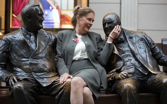 Lawrence Holofcener's newly restored sculpture “Allies”, featuring bronze figures of Sir Winston Churchill and Franklin D Roosevelt engaged in conversation, was unveiled by the late sculptor's wife, Julia Holofcener, on Bond Street, London, UK on November 7, 2017. (Photo by David Parry/Rex Features/Shutterstock)