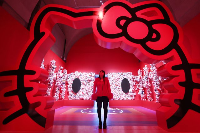 A gallery worker poses at the exhibition preview of CUTE at Somerset House in London, Britain, 24 January 2024. CUTE shows contemporary artwork and cultural phenomena such as music, fashion, toys, video games and social media to examine cute culture. The show runs at the Embankment Galleries at Somerset House from 25 January to 14 April 2024. (Photo by Neil Hall/EPA)