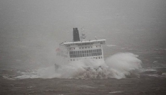 A DFDS ferry arrives in stormy conditions at the Port of Dover in Kent on Wednesday, January 1, 2025, as wind, rain and snow warnings are in force across parts of the UK, with the threat of flooding and disruption to New Year's Day travel. Large parts of England and Wales will be hit by strong winds until 3pm on Wednesday, while north-west England and Wales are forecast to see heavy rain for much of the morning. (Photo by Gareth Fuller/PA Images via Getty Images)