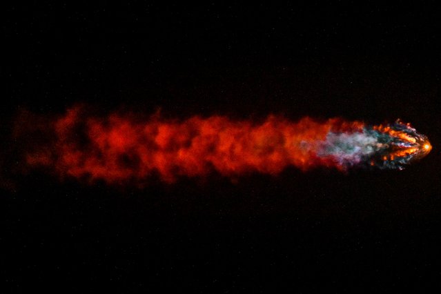 A SpaceX Crew Dragon spacecraft soars into the night sky after launching from the Kennedy Space Center in Titusville, Florida, on Monday, March 31, 2025. It was carrying a cryptocurrency billionaire and three guests for a dayslong trip that will orbit directly above Earth’s North and South poles – a feat never attempted before. (Photo by Miguel J. Rodriguez Carrillo/Getty Images)